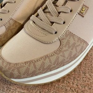 Michael Kors “Monique Trainer” sneakers. Women’s size 9.5 New!!!